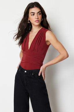 TRENDYOLMILLA Mavi Baglama Detayl? V Yaka Fitted/Vucuda Oturan Esnek C?tc?tl? Orme Body TWOSS23BD00055