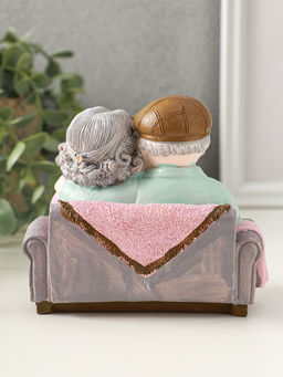 Фигурка полистоун «Дедуля с бабулей на диване читают книгу», 12×5×11 см