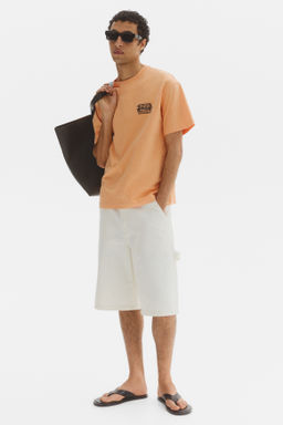 Camiseta con motivo estampado Loose Fit - H&m фото 29