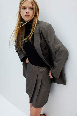 Minifalda con adorno metalico