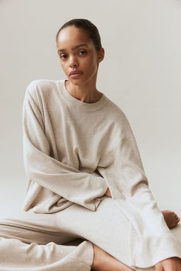 Jersey oversize con bajo redondeado