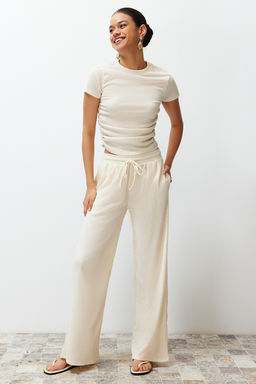 Trendyolmilla Tas Dik Yaka K?sa Kol Buzgu Detayl? Esnek Orme Bluz TWOSS24BZ00135 фото 12