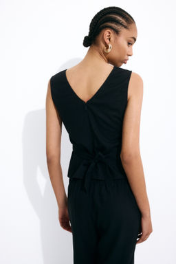 Top en mezcla de lino con lazada en la espalda - H&m фото 5