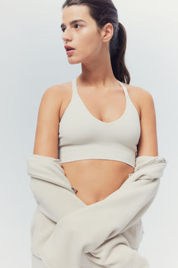 Sujetador de deporte en DryMove Medium Support - H&m фото 3