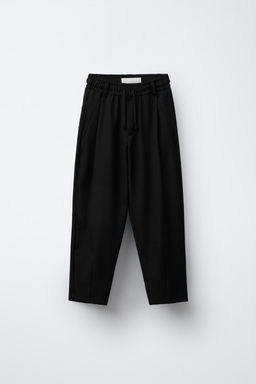 BAGGY TROUSERS WITH PLEATS