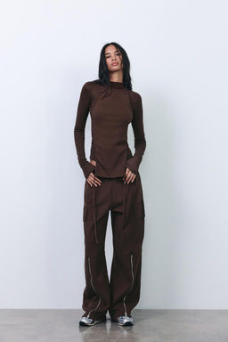 WASHED-EFFECT CARGO TROUSERS WITH ZIPS