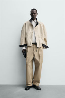 CAZADORA CUELLO CONTRASTE / Crema