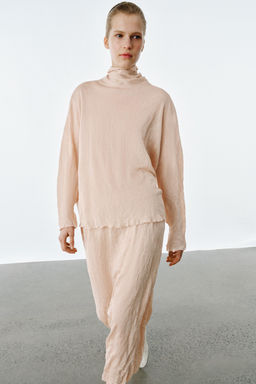 FALDA MIDI PUNTO EFECTO ARRUGADO / rosa claro - Zara фото 2