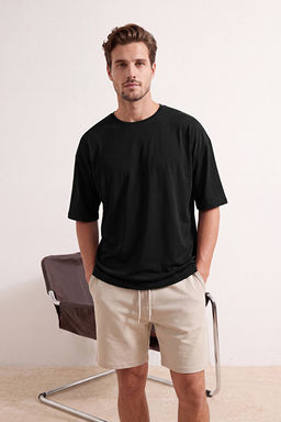 Siyah Basic Bisiklet Yaka Oversize/Geni_ Kesim K_sa Kollu T-Shirt TMNSS22TS0317