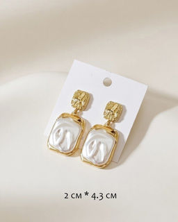 Стильные серьги