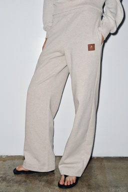 PLUSH TROUSERS WITH LABEL