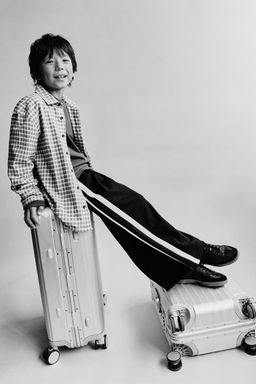 TROUSERS WITH SIDE TAPING