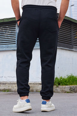 Siyah Un?sex Regular/Normal Kesim Pacas? Lastikli Ici Polar/S?cak Tutan Esofman Alt? TMNAW22EA0346