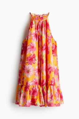 Vestido sin mangas con volantes