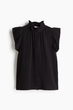 Blusa de muselina con manga circular