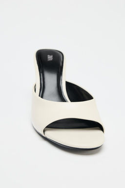LEATHER TRANSPARENT WEDGE MULES