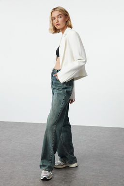 TRENDYOLMILLA Mavi Soluk Efekt Vintage Yuksek Bel Wide Leg Jeans TWOAW25JE00095
