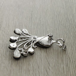 Брошь-подвеска "Жар-птица" со вставками из гелиотиса и ювелирного сплава