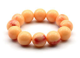 Браслет из полимера шарик 20мм цв.персиковый