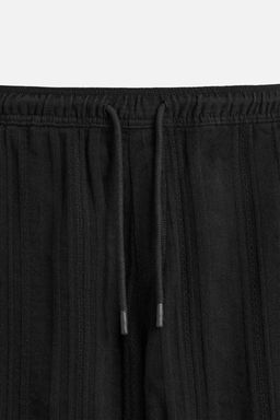 RELAXED FIT TEXTURED TROUSERS - Zara фото 11