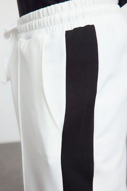 TRENDYOL MAN Siyah Oversize/Genis Kesim Ac?k Paca Renk Bloklu Esofman Alt? TMNAW25EA00006 - Trendyolmilla фото 11
