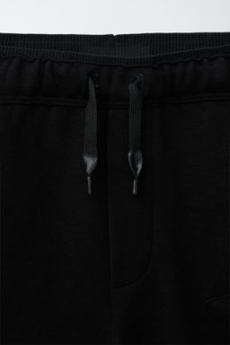 BERMUDA CARGO SPORTY / Negro - Zara фото 5