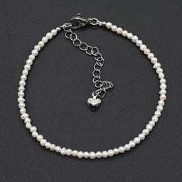 Браслет из жемчуга барокко мелкий шарик 2мм цв.белый, 17см Радуга камня