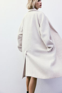 Abrigo de doble botonadura