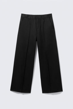 Pantalones chinos Emil de corte holgado - H&m фото 7