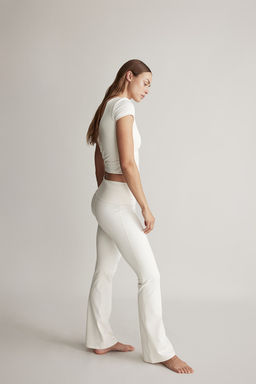 Leggings de yoga acampanados en SoftMove - H&m фото 4