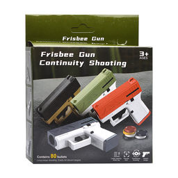 Пистолет "Агент" стреляет дисками, в коробке