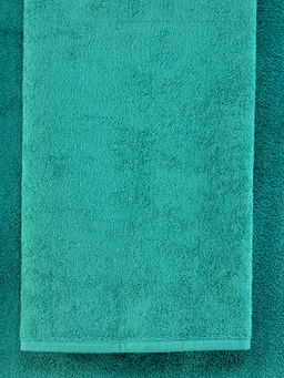 Махровое полотенце без бордюра изумрудное ПМ-15 50х90