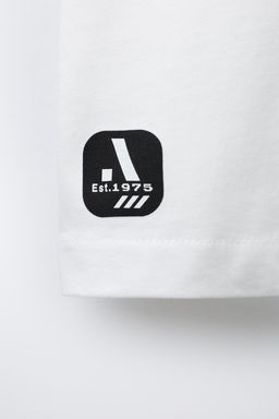 SPORTY T-SHIRT WITH SLOGAN AND STRIPES - Zara фото 4