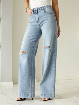 Джинсы трубы рваные из эластичного денима средней плотности