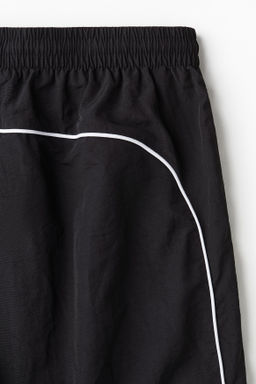 Pantal?n de ch?ndal en nailon Relaxed Fit - H&m фото 5