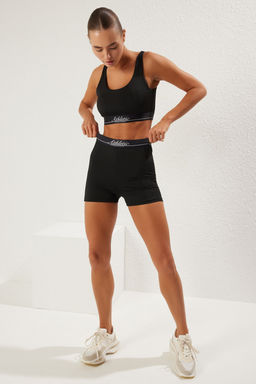 TRENDYOLMILLA Siyah Sloganl? Lastik Detayl? Orme Spor Sort/K?sa Tayt THMSS25TY00003