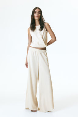 Top efecto arrugado con detalle cruzado - H&m фото 5