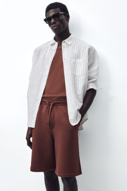 Camiseta sin mangas en canal? Slim Fit - H&m фото 8