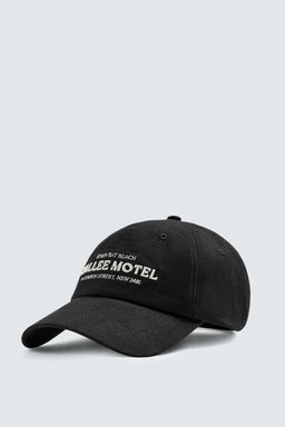 CAP WITH EMBROIDERED TEXT