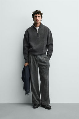 PINSTRIPED PLEATED TROUSERS