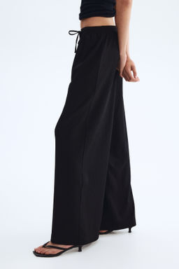 Pantalon amplio sin cierre - H&m фото 21