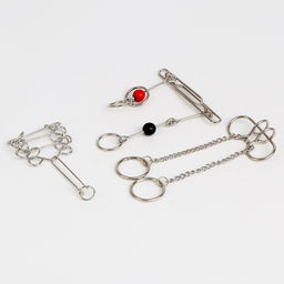 Металлические головоломки Дакер, 3 штуки - Puzzle фото 3