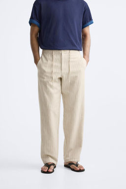 STRIPED TEXTURED TROUSERS - Zara фото 2