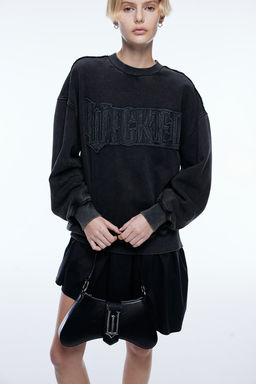 Sudadera efecto lavado con aplicacion