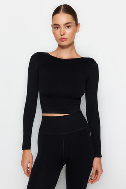 Trendyolmilla Siyah Seamless/Dikissiz S?rt ve Reflektor Bask? Detayl? Crop Orme Spor Ust/Bluz THMAW24BZ00023