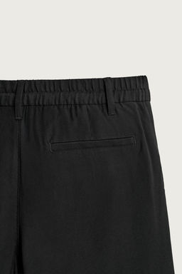 PANTAL?N FLUIDO RELAXED FIT PLIEGUES / Negro - Zara фото 12