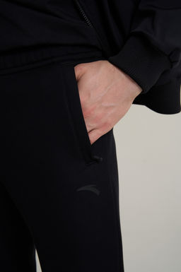 Брюки трикотажные Черный TRN ESSENTIAL Knit Track Pants