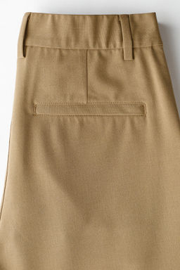 Chinos Four-way stretch Loose Fit - H&m фото 8