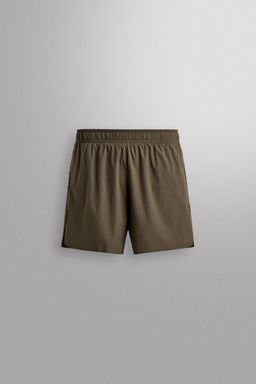 PANTALONES CORTOS LIGEROS RUNNING 3" / Verde medio