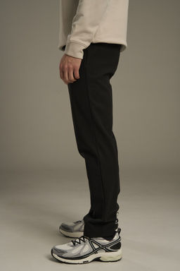 Брюки текстильные утепленные Черный ANTA TRN Woven Track Pants  фото 5